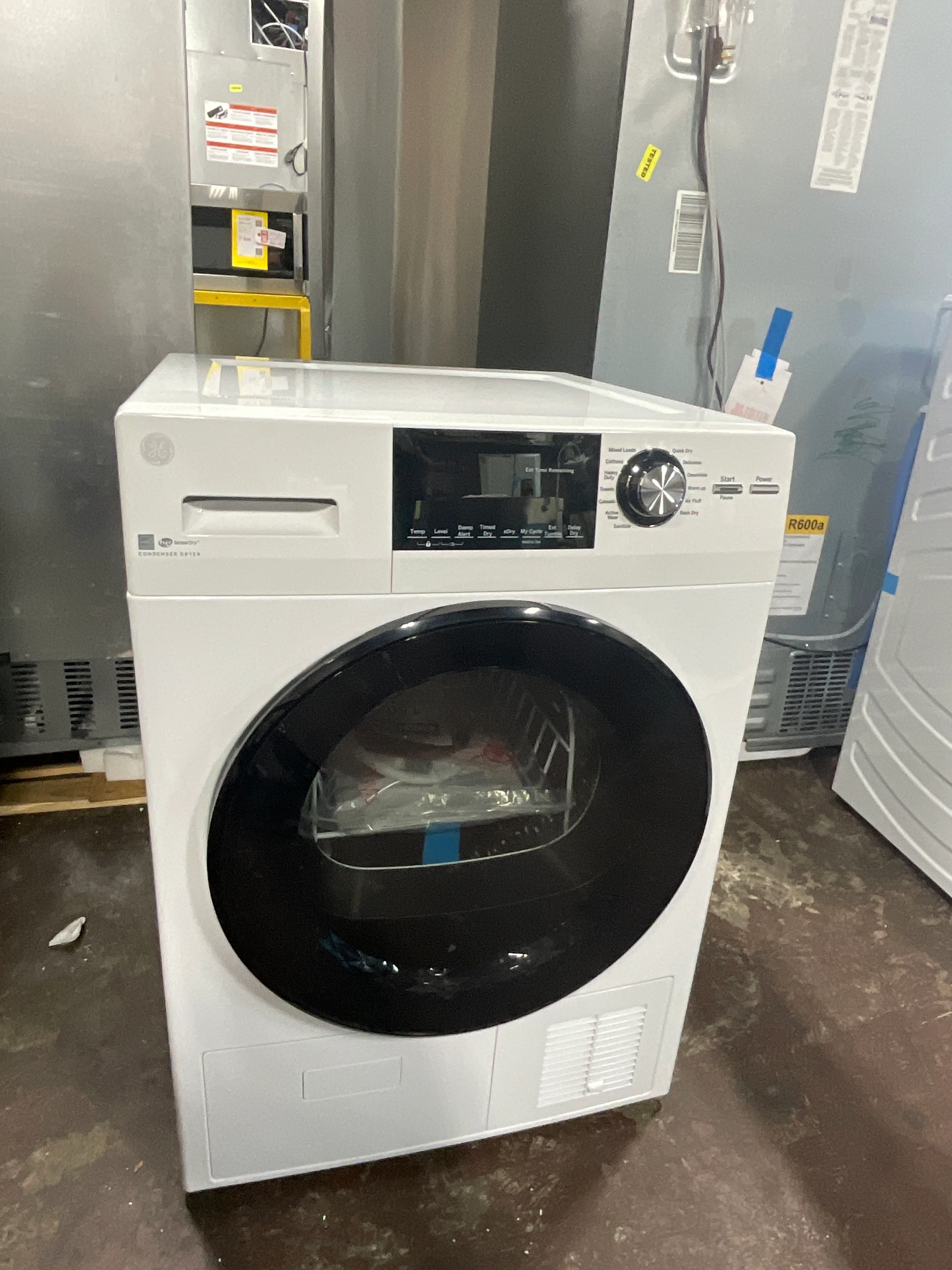 GE® 24" 4.1 Cu.Ft. Front Load Ventless Condenser Electric Dryer with Stainless Steel Basket - Image 4