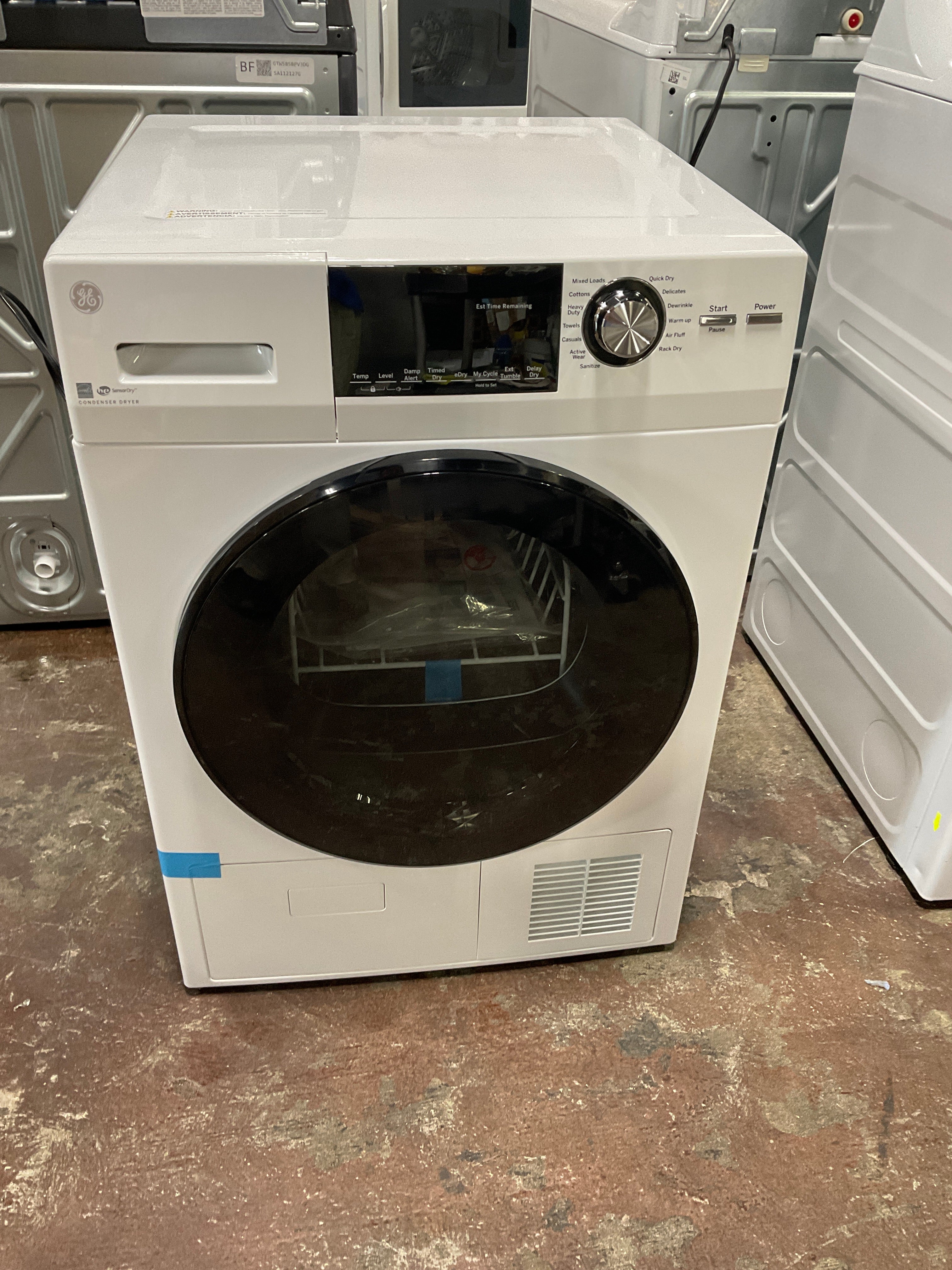 GE® 24" 4.1 Cu.Ft. Front Load Ventless Condenser Electric Dryer with Stainless Steel Basket - Image 6