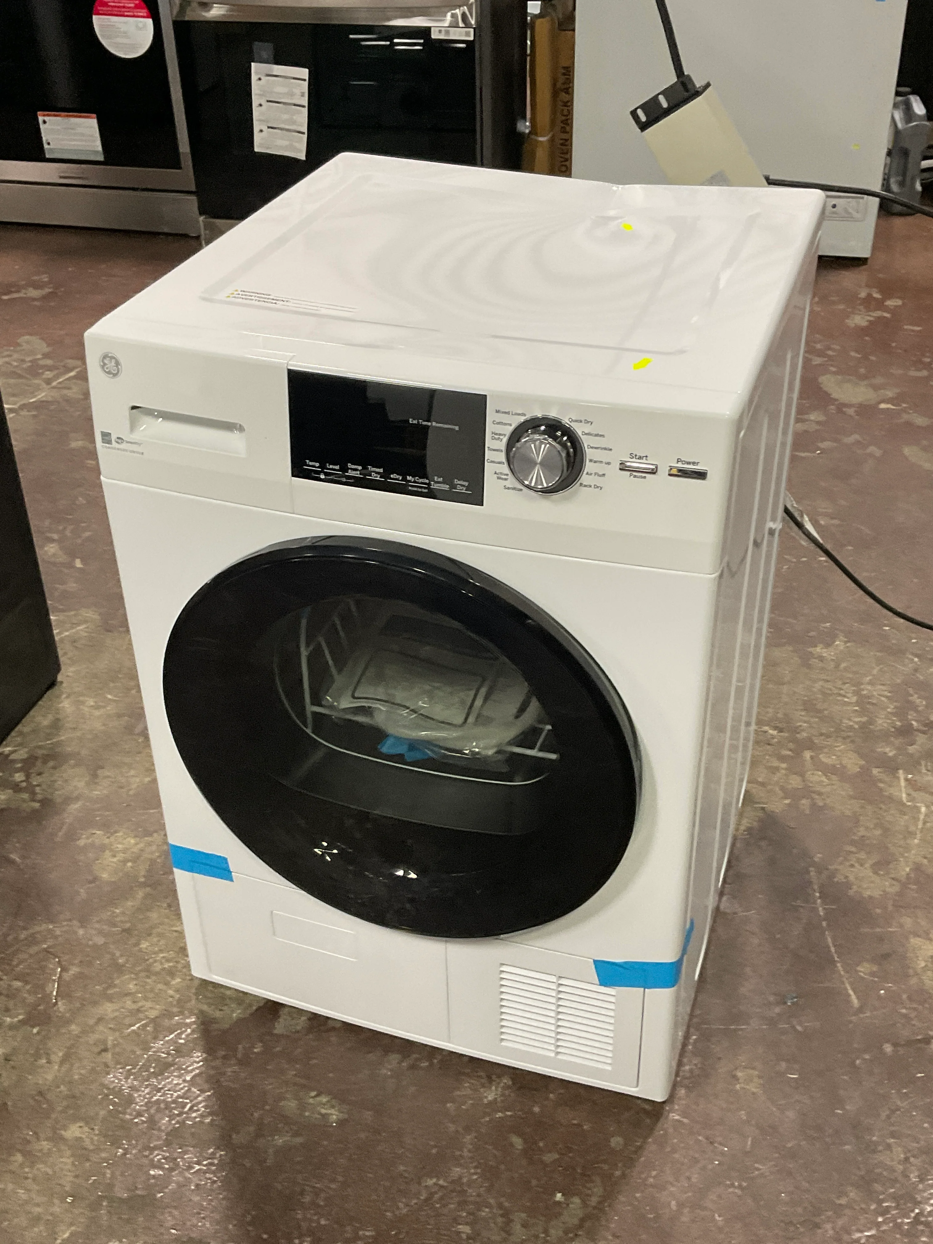 GE® 24" 4.1 Cu.Ft. Front Load Ventless Condenser Electric Dryer with Stainless Steel Basket - Image 8