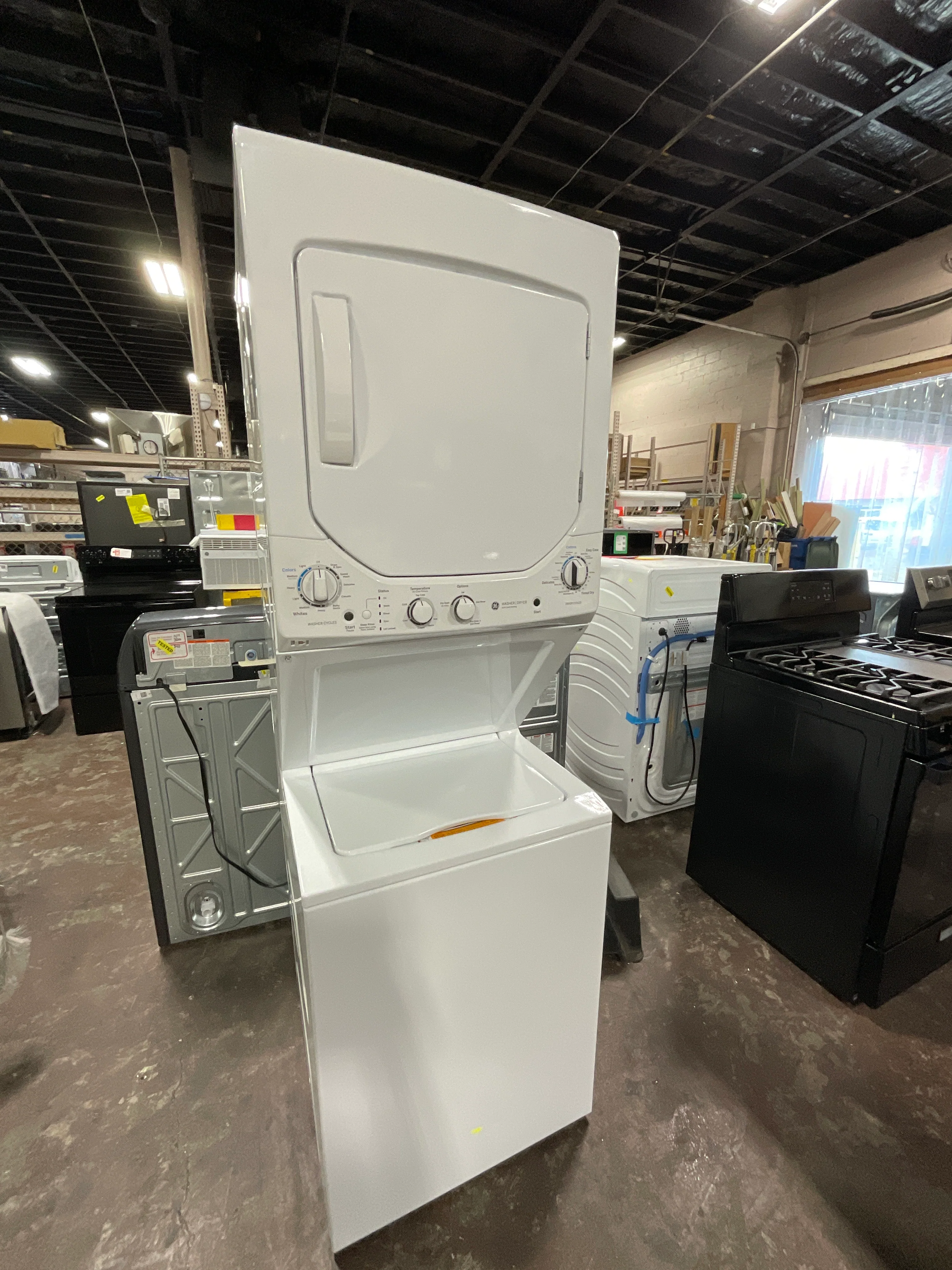 GE Unitized Spacemaker® 2.3 cu. ft. Capacity Washer with Stainless Steel Basket and 4.4 cu. ft. Capacity Electric Dryer - Image 9