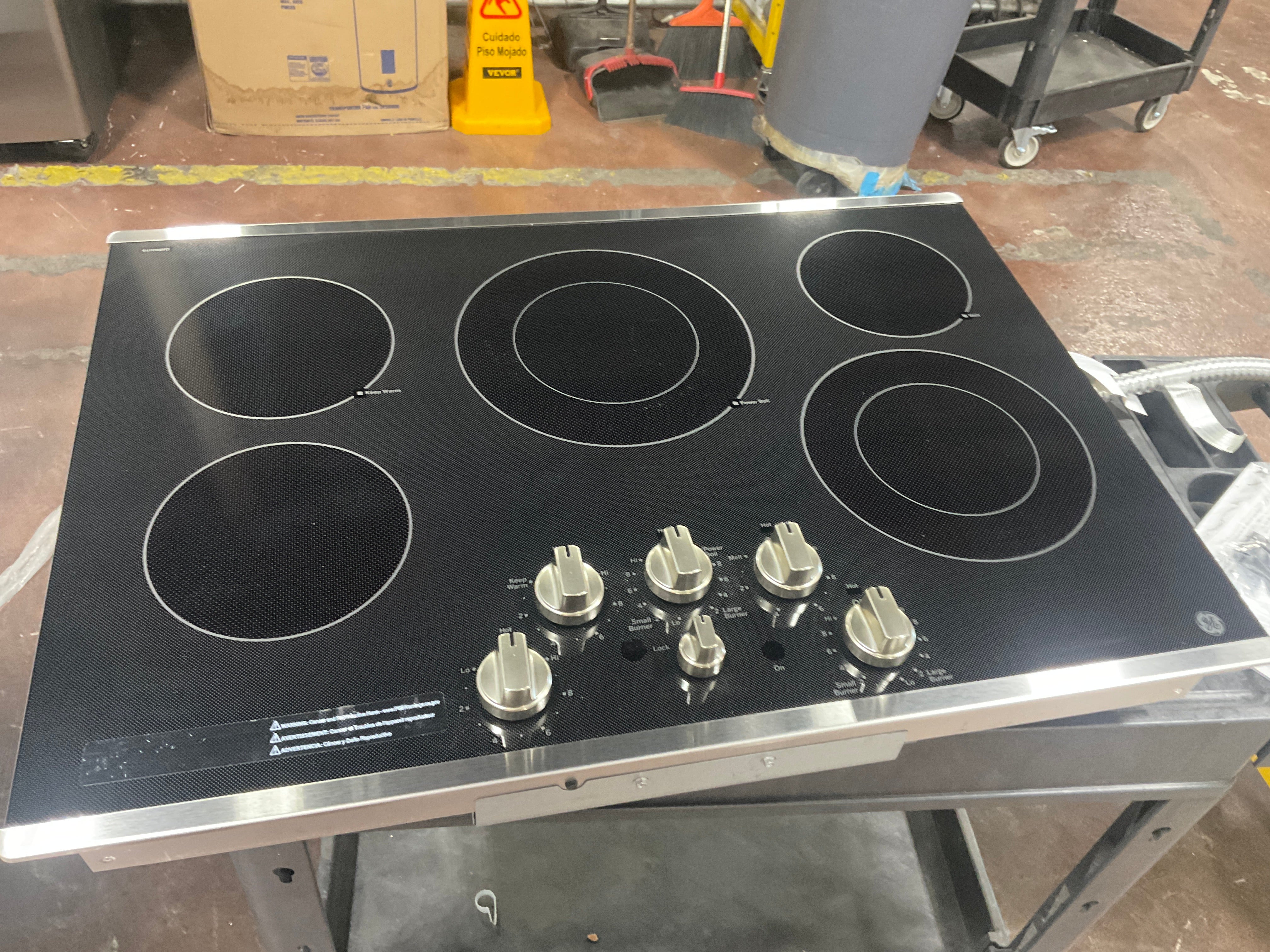 GE® 30" Built-In knob Control Electric Cooktop - Image 6