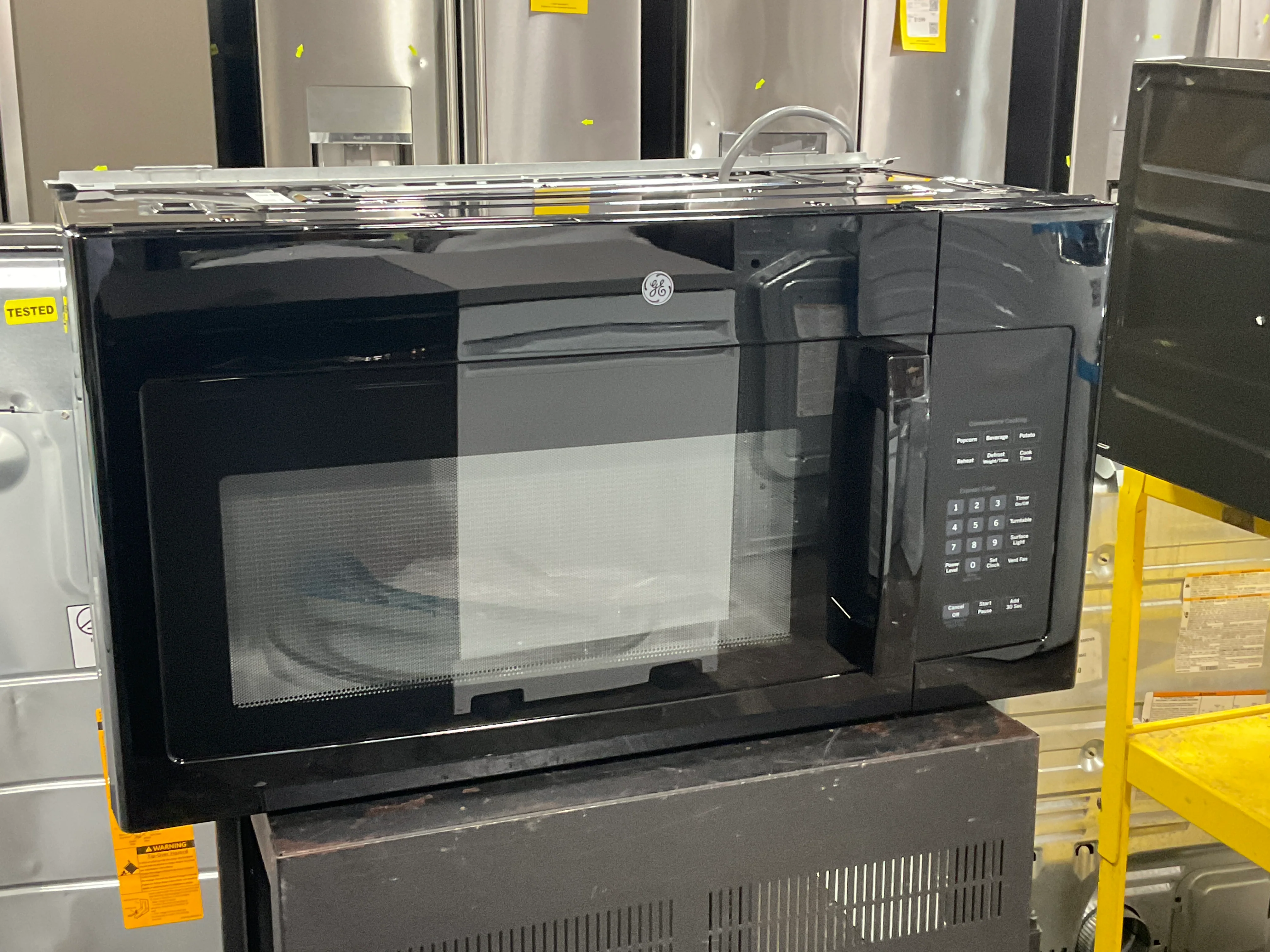 GE® 1.6 Cu. Ft. Over-the-Range Microwave Oven with Recirculating Venting - Image 6