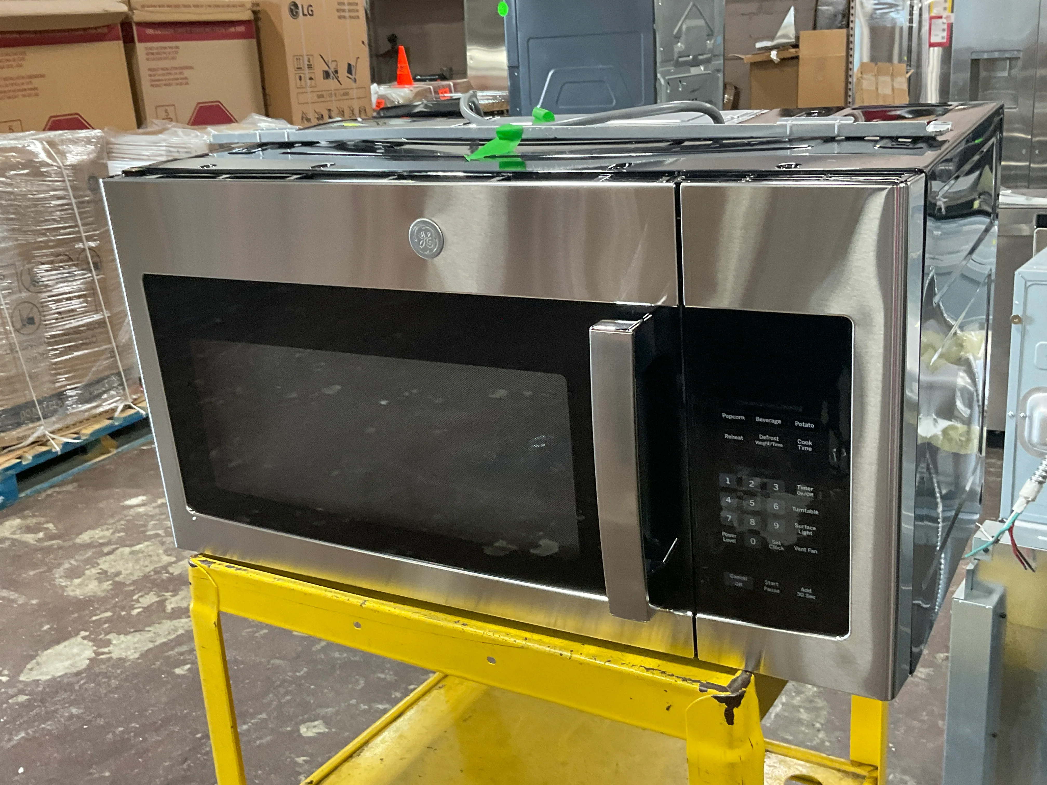 GE® 1.6 Cu. Ft. Over-the-Range Microwave Oven with Recirculating Venting - Image 7