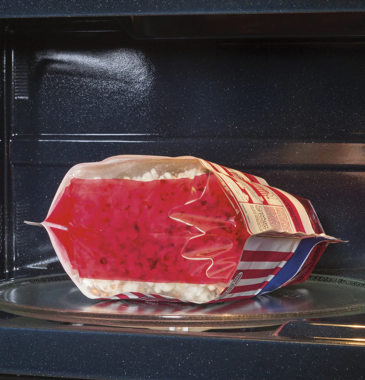 GE® 1.9 Cu. Ft. Over-the-Range Sensor Microwave Oven with Recirculating Venting - Image 4
