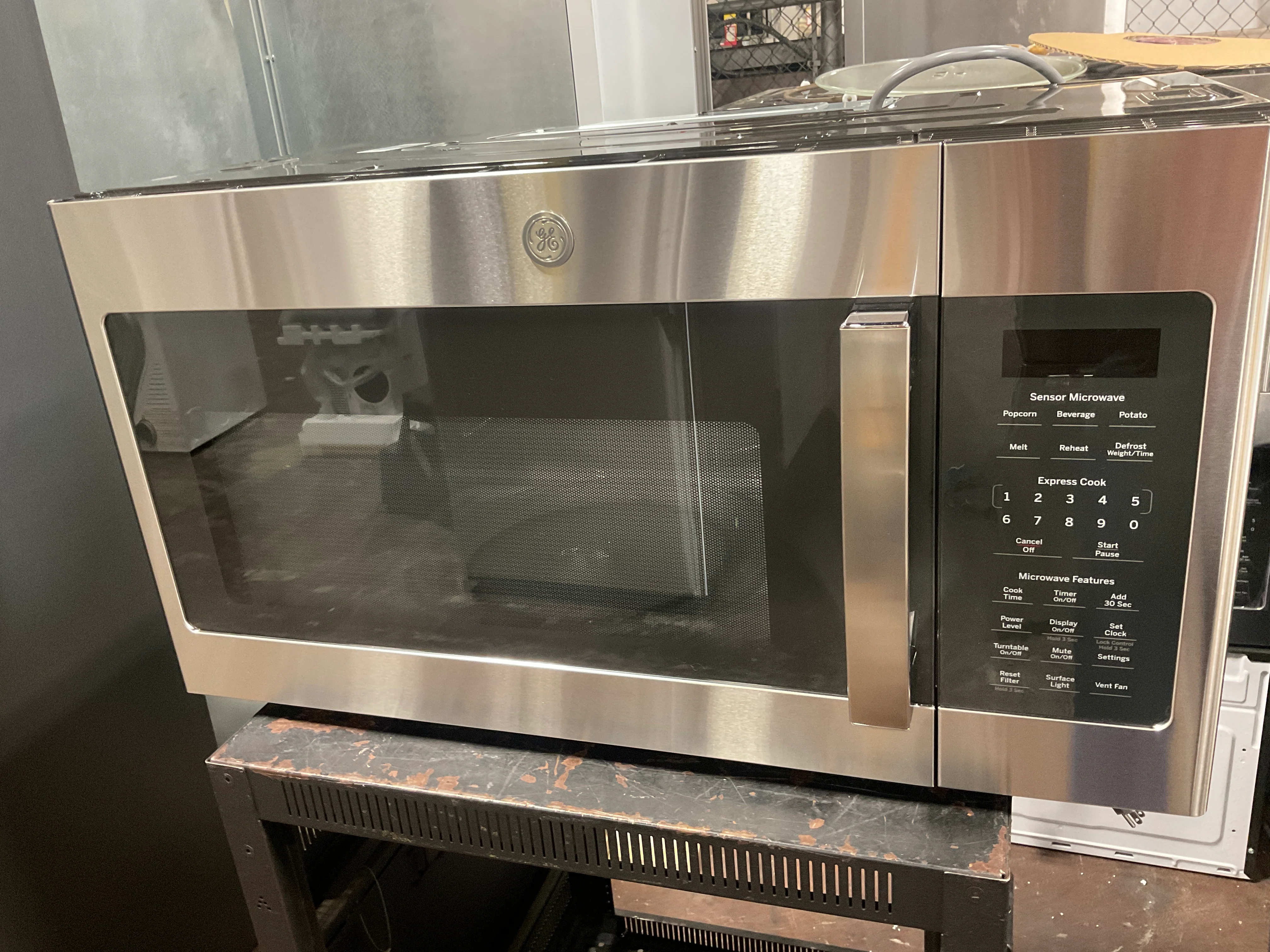 GE® 1.7 Cu. Ft. Over-the-Range Sensor Microwave Oven - Image 7