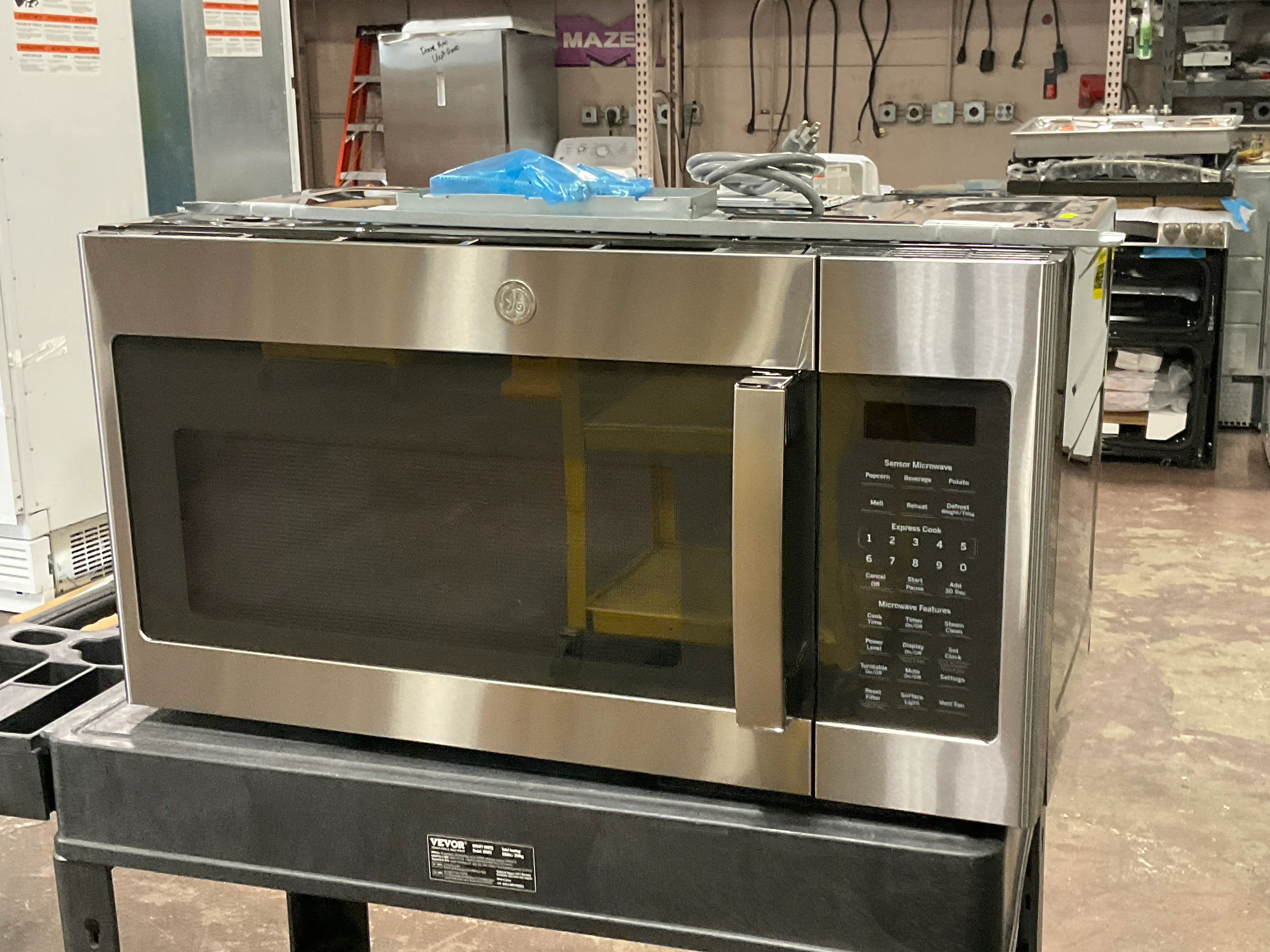 GE® 1.9 Cu. Ft. Over-the-Range Sensor Microwave Oven - Image 9