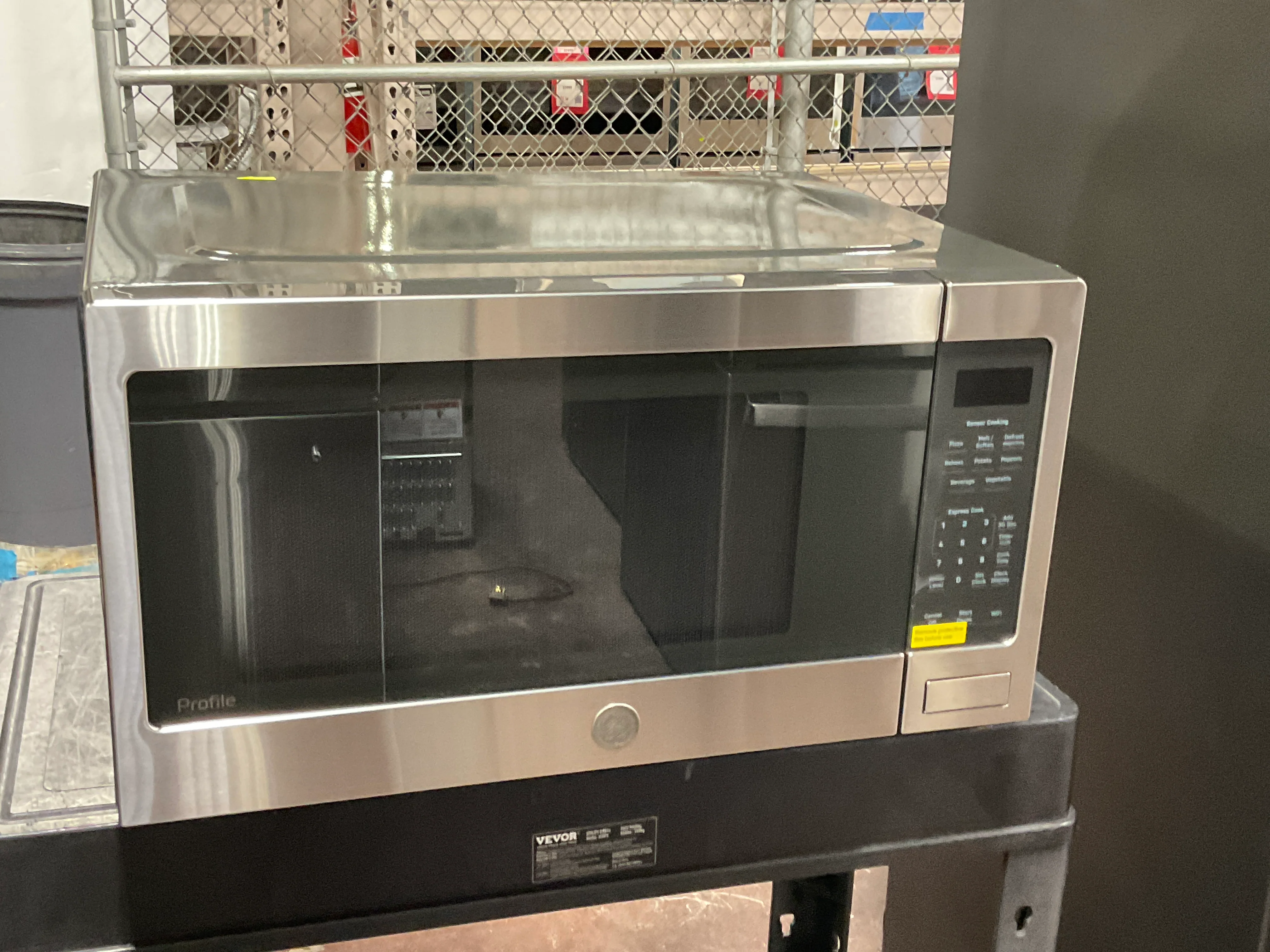 GE Profile™ 2.2 Cu. Ft. Countertop Sensor Microwave Oven - Image 8