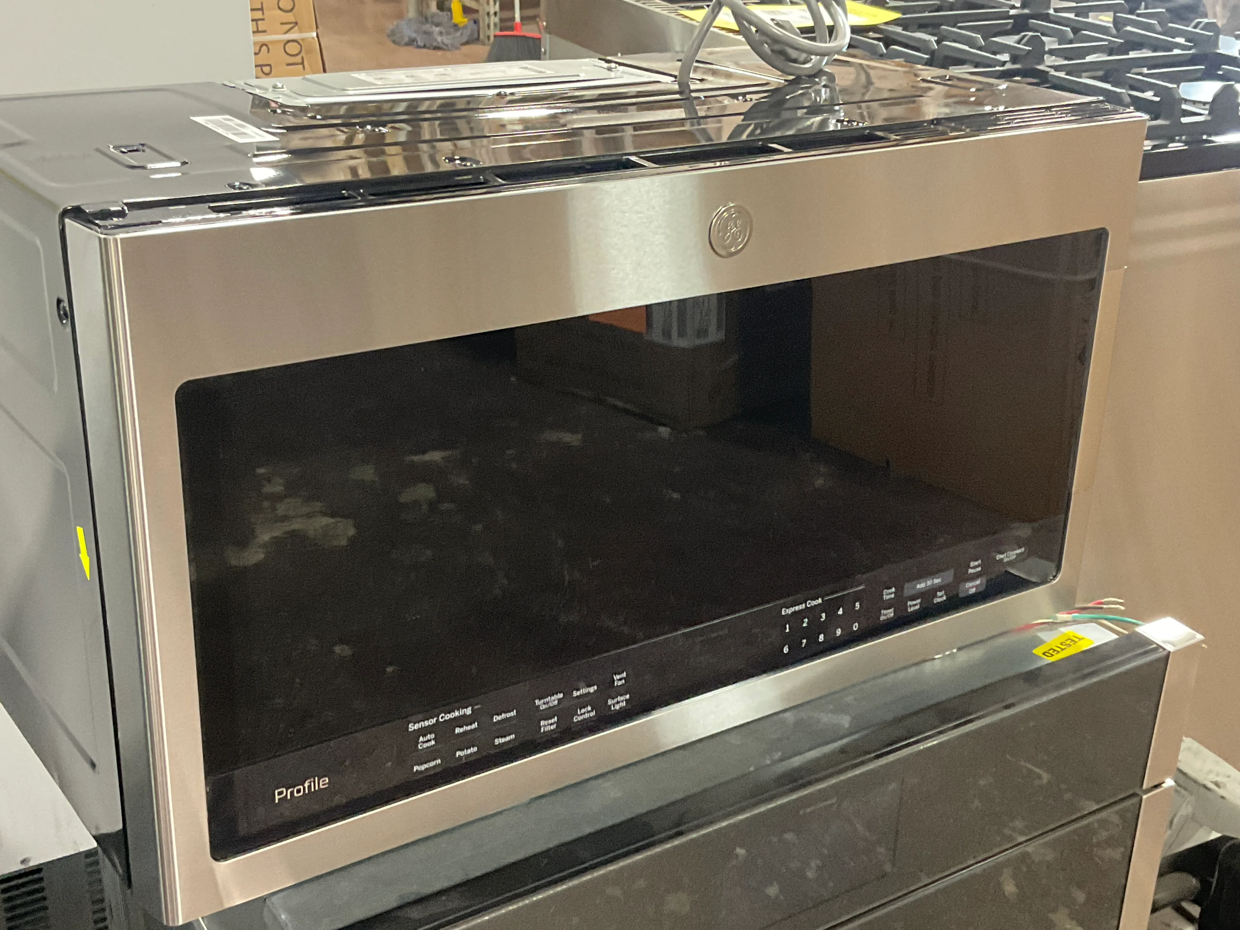 GE Profile™ 2.1 Cu. Ft. Over-the-Range Sensor Microwave Oven - Image 6