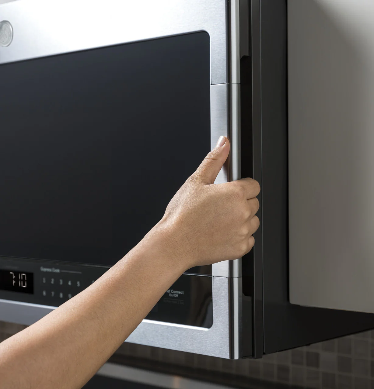 GE Profile™ 2.1 Cu. Ft. Over-the-Range Sensor Microwave Oven - Image 4